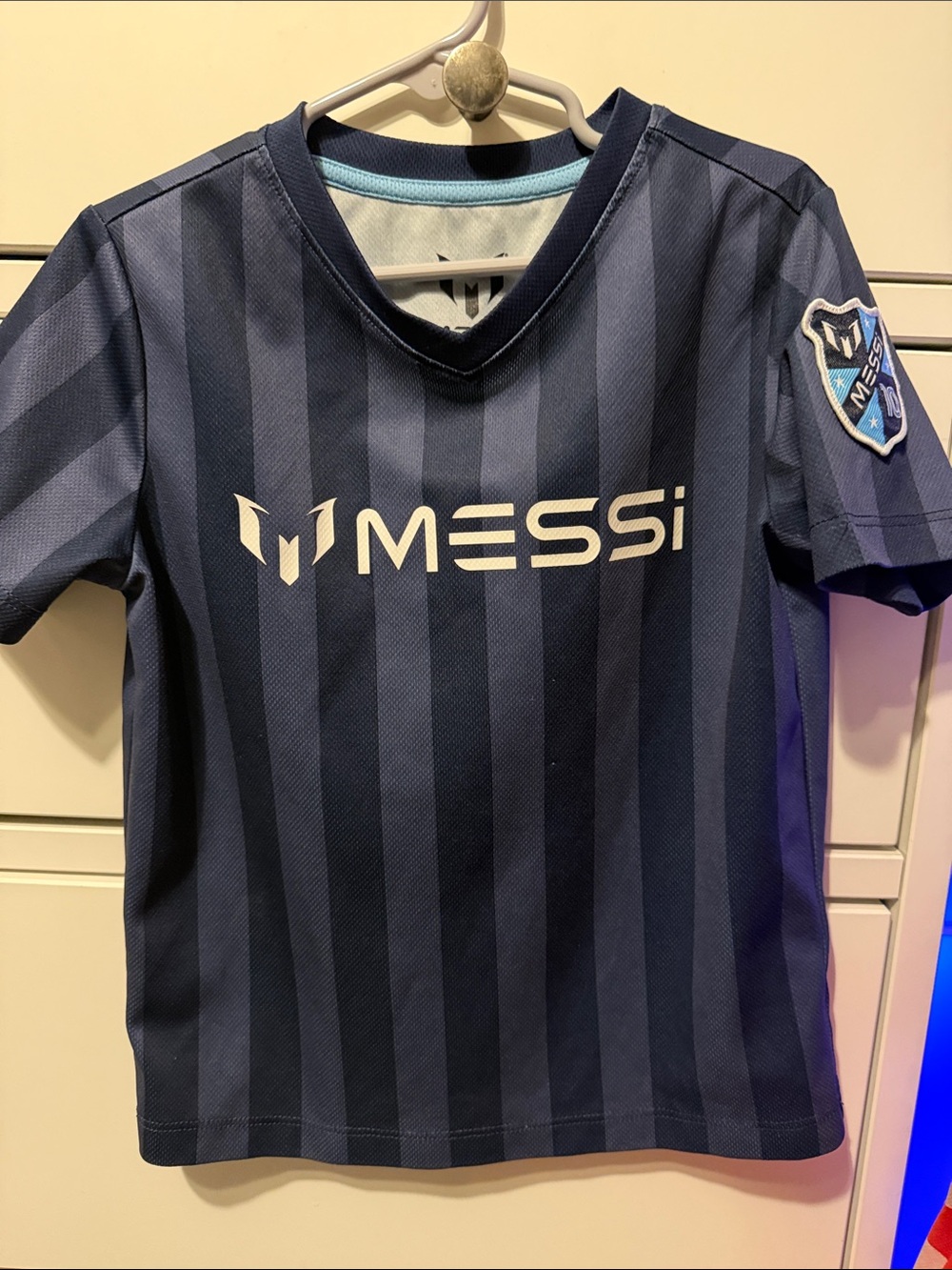 Kids' Messi Navy Stripe Short-Sleeve Soccer Top